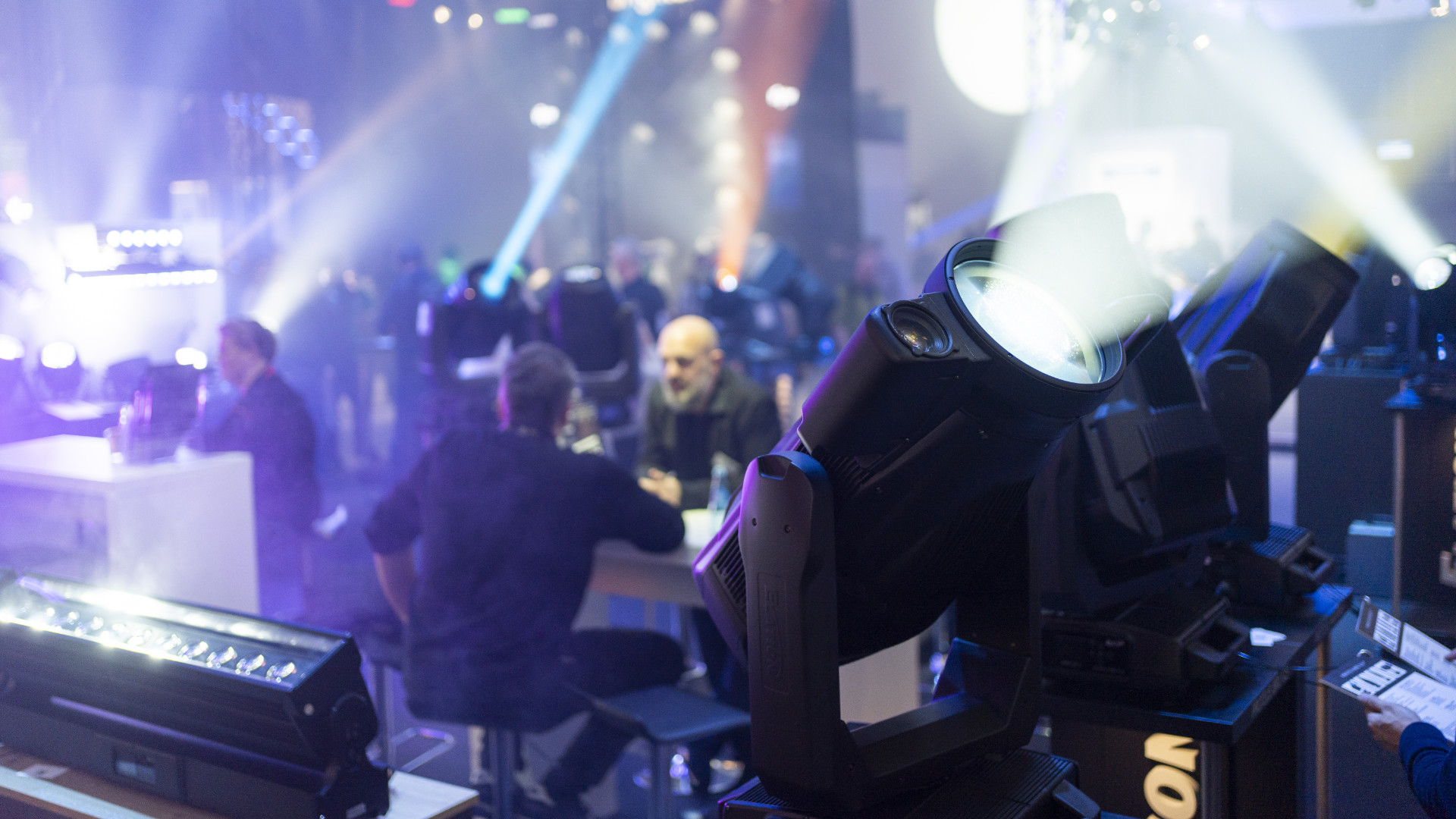 People and spotlights with blue light